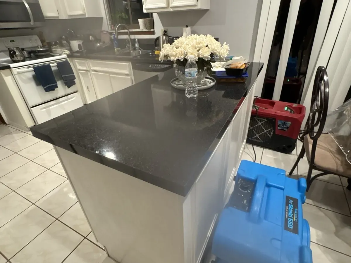 Drying equipment next to a kitchen island in Sterling Heights
